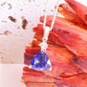 Luxuriously Faceted Trilliant Cut Tanzanite And Diamond Accent White Gold Pendant