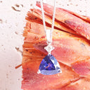 Luxuriously Faceted Trilliant Cut Tanzanite And Diamond Accent White Gold Pendant