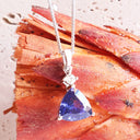 Luxuriously Faceted Trilliant Cut Tanzanite And Diamond Accent White Gold Pendant