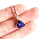 Luxuriously Faceted Trilliant Cut Tanzanite And Diamond Accent White Gold Pendant