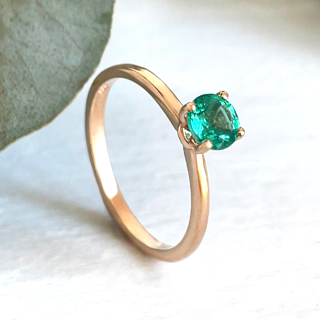 Majestic Raised Four Claw Rose Gold Emerald Ring