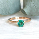 Majestic Raised Four Claw Rose Gold Emerald Ring