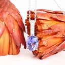 Mesmerising Oval Cut Tanzanite And Diamond Bale White Gold Pendant