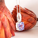 Mesmerising Oval Cut Tanzanite And Diamond Bale White Gold Pendant