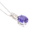 Mesmerising Oval Cut Tanzanite And Diamond Bale White Gold Pendant