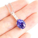 Mesmerising Oval Cut Tanzanite And Diamond Bale White Gold Pendant