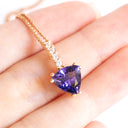 Mesmerising Trilliant Cut Tanzanite And Diamond Bale Rose Gold Pendant