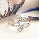 Blue Topaz and diamond white gold ring