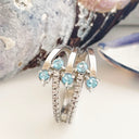 Blue Topaz and diamond white gold ring