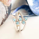 Blue Topaz and diamond white gold ring