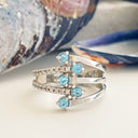 Blue Topaz and diamond white gold ring