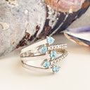 Blue Topaz and diamond white gold ring