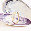 Neatly Bound White Diamond Ring in Yellow Gold