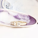 Neatly Bound White Diamond Ring in Yellow Gold