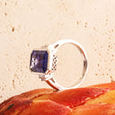Opulent Emerald Cut Tanzanite With Emerald Cut Shoulder Diamonds White Gold Ring