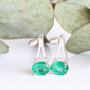 Oval Cut Emerald White Gold Drop Earrings with Diamond Crown Accent