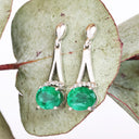 Oval Cut Emerald White Gold Drop Earrings with Diamond Crown Accent