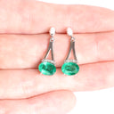 Oval Cut Emerald White Gold Drop Earrings with Diamond Crown Accent