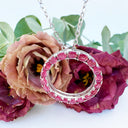 Oval Cut Ruby Halo Silver Pendant