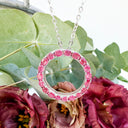 Oval Cut Ruby Halo Silver Pendant