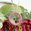 Oval Cut Ruby Halo Silver Pendant