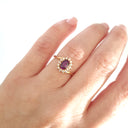 Oval Grape Garnet and Diamond Halo ring