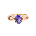 Oval Tanzanite Ring With Diamond Half Infinity Twist Shoulders in Rose Gold