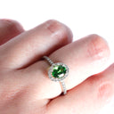 Pedestal Set Tsavorite and Diamond Halo Ring