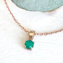 Petite 4 Claw Rose Gold Emerald Pendant