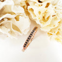 Petite Four Claw Channel Set Black Diamond Rose Gold Ring