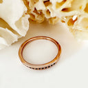 Petite Four Claw Channel Set Black Diamond Rose Gold Ring
