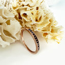 Petite Four Claw Channel Set Black Diamond Rose Gold Ring