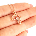 Petite Map of Africa Protea Pendant In Rose Gold