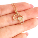 Petite Map of Africa Protea Pendant In Yellow Gold