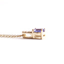 Petite Oval Tanzanite Yellow Gold Pendant with White Diamond Bale Highlight
