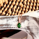 Petite Oval Tsavorite Rose Gold Pendant with White Diamond Bale Highlight