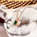 Petite Oval Tsavorite Rose Gold Pendant with White Diamond Bale Highlight