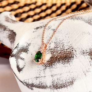 Petite Oval Tsavorite Rose Gold Pendant with White Diamond Bale Highlight