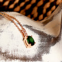 Petite Oval Tsavorite Rose Gold Pendant with White Diamond Bale Highlight
