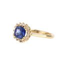 Poised Cushion Cut Sapphire And Diamond Halo Yellow Gold Ring