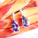 Prestigious Pear Cut Tanzanite And Delightful Diamond Highlight White Gold Earrings