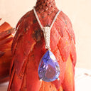 Prestigious Pear Cut Tanzanite And Delightful Diamond Highlight White Gold Pendant