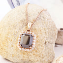 Radiant Emerald Cut Black Diamond With White Diamond Halo Rose Gold Pendant