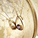 Raindrop Tanzanite and Yellow Gold Pendant