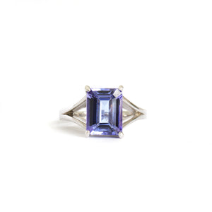 Regal Elevated Emerald Cut Tanzanite Solitaire White Gold Ring