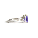Regal Elevated Emerald Cut Tanzanite Solitaire White Gold Ring