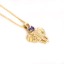 Relief Elephant Tanzanite Yellow Gold Pendant