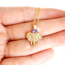Relief Elephant Tanzanite Yellow Gold Pendant