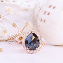 Rose Cut Pear Shaped Black Diamond Ring With White Diamond Halo in Rose Gold