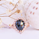 Rose Cut Pear Shaped Black Diamond Ring With White Diamond Halo in Rose Gold